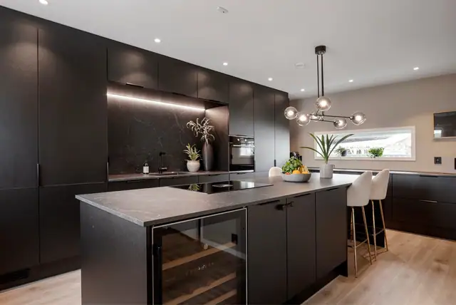 Påkostet og utvider kjøkken fra JKE Design.