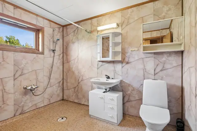 Romslig bad på 6m².