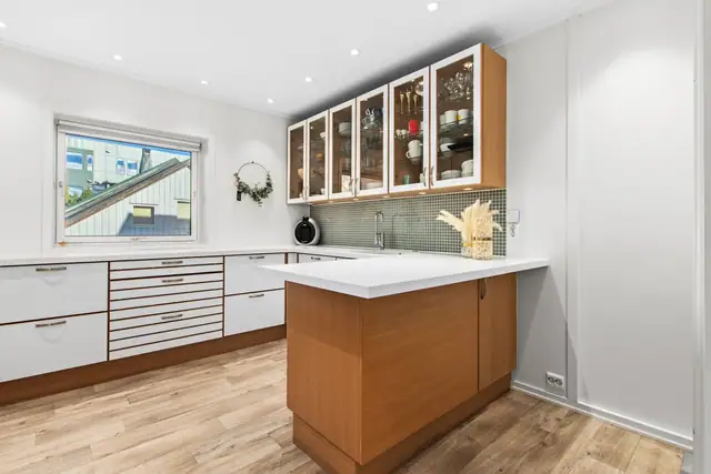 Kjøkken er adskilt fra stuen og er ca. 11,5m².